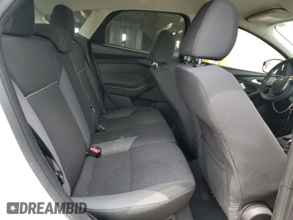 2014 Ford Focus SE z VIN 1FADP3K22EL119306, wystawiony jako Copart lot #56653505 z przebiegiem 109 021 mil mil oraz Czysty tytuł • Clean title. Historia ofert i sprzedaży dostępna na DreamBid. Obrazek 10.