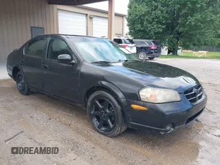 2001 Nissan Maxima SE z VIN JN1CA31D71T834010, wystawiony jako IAAI lot #42317556 z przebiegiem 193 494 mil mil oraz . Historia ofert i sprzedaży dostępna na DreamBid. Obrazek 1.