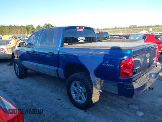 2010 Dodge Dakota Bighorn/Lonestar with VIN 1D7CW3GP5AS130870, listed as a IAAI auction lot 40929651 with 128,077 mi miles. Bid and sale history available at carsss.com. Image 13.
