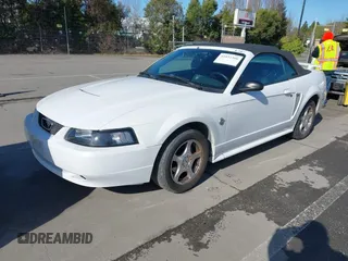 2004 Ford Mustang Deluxe with VIN 1FAFP44654F181293, listed as a IAAI auction lot 41831366 with 122,636 mi miles. Bid and sale history available at carsss.com. Image 2.