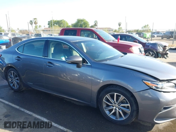 2016 Lexus ES 300h z VIN JTHBW1GG6G2108510, wystawiony jako IAAI lot #41959175 z przebiegiem 142 882 mil mil oraz . Historia ofert i sprzedaży dostępna na DreamBid. Obrazek 13.