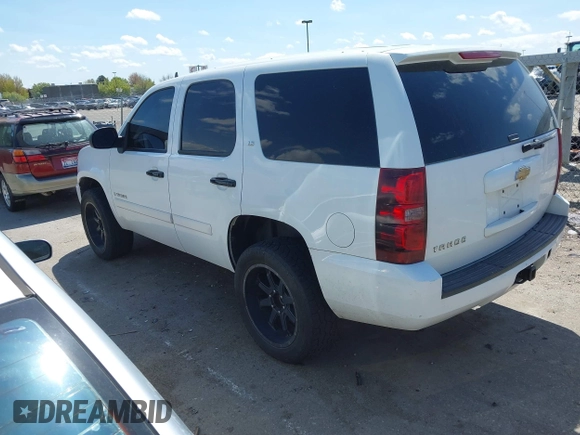 2007 Chevrolet Tahoe LS with VIN 1GNFC13C77J404051, listed as a IAAI auction lot 42093772 with 213,729 mi miles and . Bid and sale history available at DreamBid. Image 3.