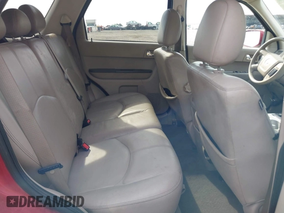 2008 Mercury Mariner Premier with VIN 4M2CU87158KJ12964, listed as a IAAI auction lot 42105891 with 202,194 mi miles and . Bid and sale history available at DreamBid. Image 8.