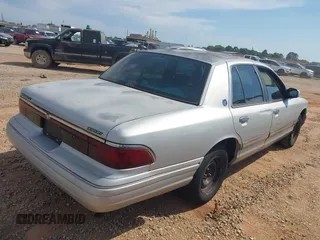 1996 Mercury Grand Marquis GS z VIN 2MELM74W7TX683568, wystawiony jako IAAI lot #42175816 z przebiegiem 56 126 mil mil oraz . Historia ofert i sprzedaży dostępna na DreamBid. Obrazek 4.