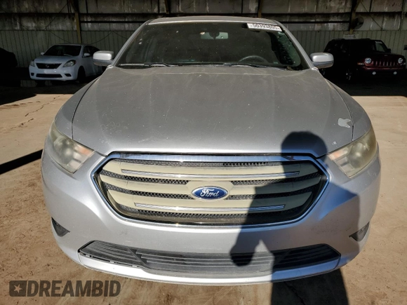 2013 Ford Taurus SEL with VIN 1FAHP2E86DG102656, listed as a Copart auction lot 50393805 with 212,804 mi miles and Clean Title. Bid and sale history available at carsss.com. Image 5.