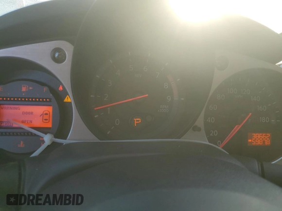 2014 Nissan 370Z Touring with VIN JN1AZ4FH4EM620092, listed as a Copart auction lot 77439254 with 38,662 mi miles and Salvage Title. Bid and sale history available at DreamBid. Image 9.