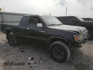 1997 Toyota T100 SR5 with VIN JT4UN24D9V0050303, listed as a Copart auction lot 68910134 with 281,477 mi miles and Salvage Title. Bid and sale history available at DreamBid. Image 4.