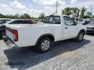 1998 Nissan Frontier XE z VIN 1N6DD21S5WC335549, wystawiony jako Copart lot #61021245 z przebiegiem 310 230 mil mil oraz Czysty tytuł • Clean title. Historia ofert i sprzedaży dostępna na DreamBid. Obrazek 3.