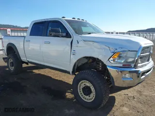 2011 Ram 2500 SLT with VIN 3D7UT2CLXBG628954, listed as a IAAI auction lot 42034694 with 195,253 mi miles. Bid and sale history available at carsss.com. Image 1.