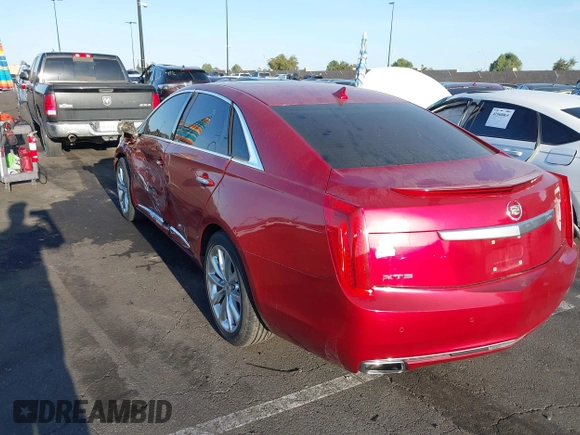 2013 Cadillac XTS Luxury with VIN 2G61P5S3XD9115546, listed as a IAAI auction lot 41980135 with 104,609 mi miles and . Bid and sale history available at DreamBid. Image 3.