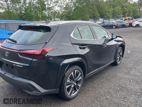 2025 Lexus UX 300h with VIN JTHUCJDH8S2003698, listed as a Copart auction lot 56182345 with 1,111 mi miles and Salvage title. Bid and sale history available at DreamBid. Image 4.