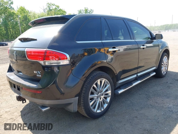 2011 Lincoln MKX with VIN 2LMDJ8JKXBBJ31273, listed as a IAAI auction lot 42170426 with 127,880 mi miles. Bid and sale history available at carsss.com. Image 4.