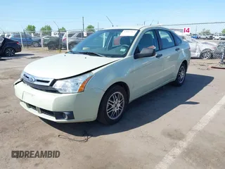 2011 Ford Focus SE with VIN 1FAHP3FN9BW167286, listed as a IAAI auction lot 42087263 with 71,923 mi miles. Bid and sale history available at carsss.com. Image 2.