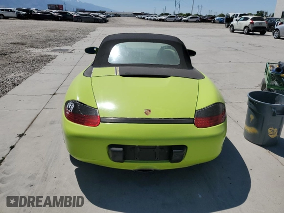1999 Porsche Boxster with VIN WP0CA2987XU622760, listed as a Copart auction lot 59898355 with 104,425 mi miles and Salvage title. Bid and sale history available at DreamBid. Image 6.