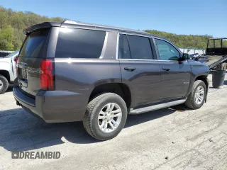 2015 Chevrolet Tahoe LT z VIN 1GNSKBKC6FR156951, wystawiony jako Copart lot #54666335 z przebiegiem 156 139 mil mil oraz Szkoda całkowita • Salvage title. Historia ofert i sprzedaży dostępna na DreamBid. Obrazek 3.