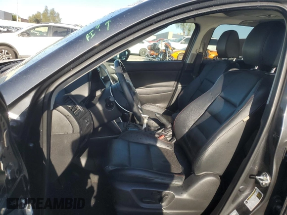 2014 Mazda CX-5 Grand Touring with VIN JM3KE4DY1E0328852, listed as a Copart auction lot 53965265 with 67,242 mi miles and Salvage Title. Bid and sale history available at DreamBid. Image 7.