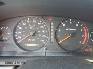 2000 Nissan Frontier XE with VIN 1N6DD26SXYC393054, listed as a Copart auction lot 62410125 with 106,319 mi miles and Salvage title. Bid and sale history available at DreamBid. Image 9.