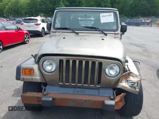 2005 Jeep Wrangler Sport with VIN 1J4FA49SX5P317120, listed as a IAAI auction lot 42677397 with 71,403 mi miles and . Bid and sale history available at DreamBid. Image 6.
