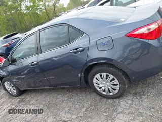 2019 Toyota Corolla L with VIN 5YFBURHE8KP936426, listed as a IAAI auction lot 42029018 with 190,163 mi miles and . Bid and sale history available at DreamBid. Image 14.