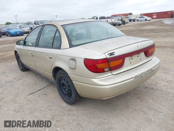 2002 Saturn SL z VIN 1G8ZK52732Z131361, wystawiony jako IAAI lot #42358215 z przebiegiem 228 184 mil mil oraz . Historia ofert i sprzedaży dostępna na DreamBid. Obrazek 3.