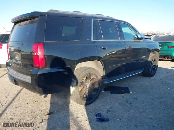 2016 Chevrolet Tahoe LTZ with VIN 1GNSKCKC1GR381785, listed as a IAAI auction lot 41376945 with 120,279 mi miles. Bid and sale history available at carsss.com. Image 4.