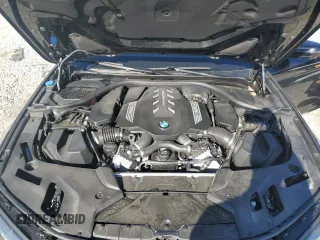 2023 BMW 5 Series M550i xDrive z VIN WBA13BK08PCM88687, wystawiony jako Copart lot #88633545 z przebiegiem Nie podano mil oraz Szkoda całkowita • Salvage title. Historia ofert i sprzedaży dostępna na DreamBid. Obrazek 12.