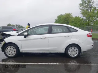 2016 Ford Fiesta S z VIN 3FADP4AJ1GM205836, wystawiony jako IAAI lot #42267013 z przebiegiem 96 778 mil mil oraz . Historia ofert i sprzedaży dostępna na DreamBid. Obrazek 14.