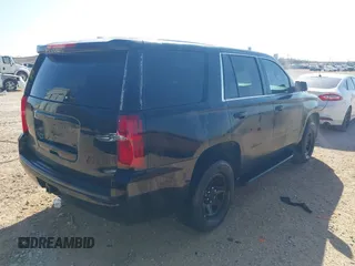 2015 Chevrolet Tahoe Commercial z VIN 1GNLC2EC7FR575386, wystawiony jako IAAI lot #41836137 z przebiegiem 143 231 mil mil oraz . Historia ofert i sprzedaży dostępna na DreamBid. Obrazek 4.