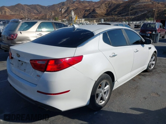2015 Kia Optima LX with VIN 5XXGM4A71FG402624, listed as a IAAI auction lot 40493003 with 100,237 mi miles. Bid and sale history available at carsss.com. Image 4.