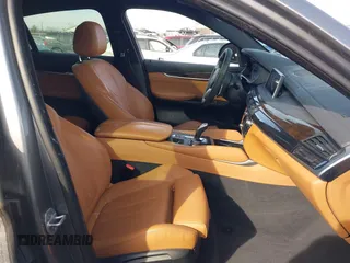 2018 BMW X6 xDrive50i with VIN 5UXKU6C50J0W39146, listed as a IAAI auction lot 41652073 with 108,258 mi miles. Bid and sale history available at carsss.com. Image 5.