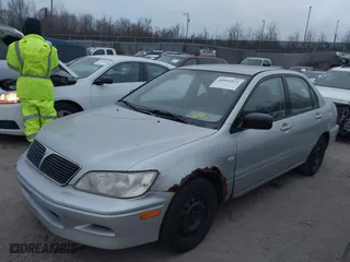2002 Mitsubishi Lancer ES with VIN JA3AJ26E62U060214, listed as a IAAI auction lot 40961872 with 150,399 mi miles. Bid and sale history available at carsss.com. Image 6.
