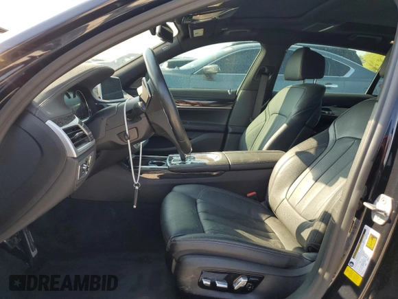 2019 BMW 7 Series 740i with VIN WBA7E2C50KB216499, listed as a Copart auction lot 68828673 with 94,549 mi miles. Bid and sale history available at carsss.com. Image 7.