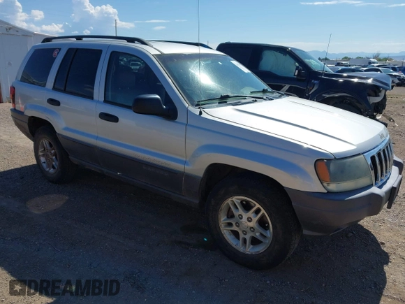 2002 Jeep Grand Cherokee Laredo with VIN 1J4GX48S52C249574, listed as a IAAI auction lot 42458883 with 89,028 mi miles and . Bid and sale history available at DreamBid. Image 1.