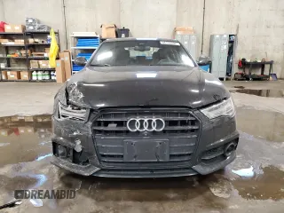 2016 Audi S6 Prestige z VIN WAUH2AFC4GN096343, wystawiony jako Copart lot #68166002 z przebiegiem 111 836 mil mil oraz . Historia ofert i sprzedaży dostępna na DreamBid. Obrazek 5.