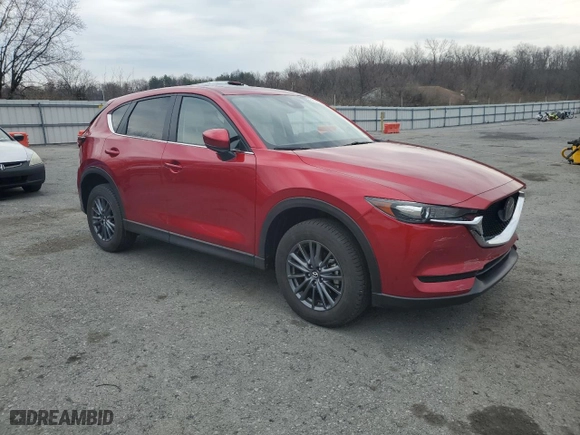 2021 Mazda CX-5 Touring with VIN JM3KFBCMXM1451736, listed as a Copart auction lot 51019245 with 9,789 mi miles and Salvage Title. Bid and sale history available at carsss.com. Image 4.