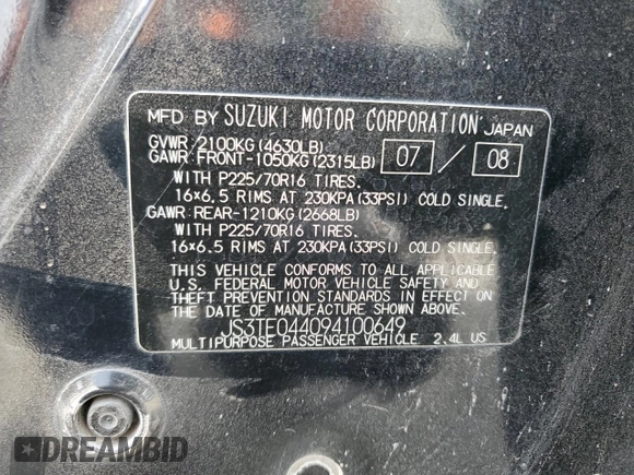 2009 Suzuki Grand Vitara with VIN JS3TE044094100649, listed as a Copart auction lot 52033855 with 137,460 mi miles and Salvage title. Bid and sale history available at DreamBid. Image 13.