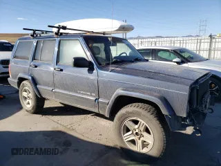 2000 Jeep Cherokee Limited with VIN 1J4FF68S0YL250926, listed as a Copart auction lot 84837244 with 141,020 mi miles and Salvage Title. Bid and sale history available at carsss.com. Image 4.
