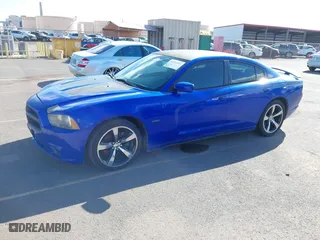 2013 Dodge Charger RT Max with VIN 2C3CDXCT6DH715161, listed as a IAAI auction lot 41722473 with 121,077 mi miles. Bid and sale history available at carsss.com. Image 2.
