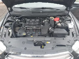 2013 Ford Taurus SEL with VIN 1FAHP2E83DG107913, listed as a IAAI auction lot 42007575 with 147,240 mi miles. Bid and sale history available at carsss.com. Image 10.