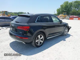 2018 Audi Q5 Premium Plus z VIN WA1BNAFY7J2231166, wystawiony jako IAAI lot #42048232 z przebiegiem 81 818 mil mil oraz . Historia ofert i sprzedaży dostępna na DreamBid. Obrazek 4.