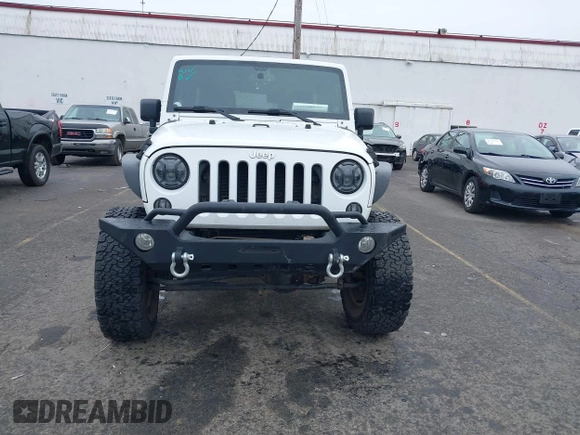 2014 Jeep Wrangler Unlimited Rubicon with VIN 1C4BJWFGXEL283929, listed as a IAAI auction lot 41812052 with 137,790 mi miles and . Bid and sale history available at DreamBid. Image 12.