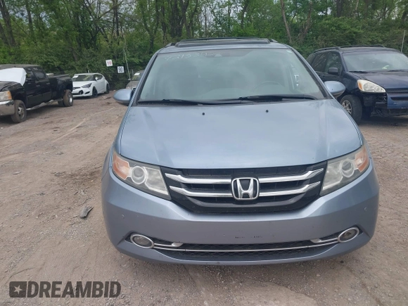 2014 Honda Odyssey Touring with VIN 5FNRL5H91EB081811, listed as a IAAI auction lot 42153920 with 16 mi miles and . Bid and sale history available at DreamBid. Image 12.