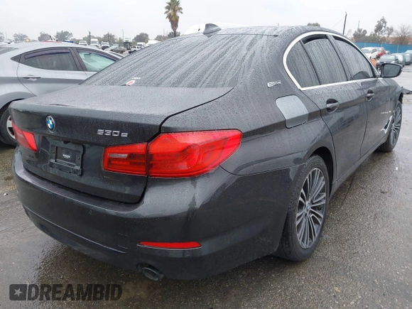 2019 BMW 5 Series 530e iPerformance with VIN WBAJA9C53KB399794, listed as a IAAI auction lot 41561874 with Not Provided miles. Bid and sale history available at carsss.com. Image 4.