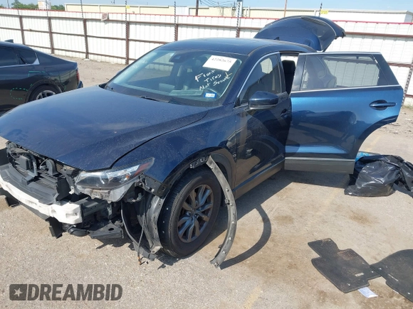 2020 Mazda CX-9 Touring with VIN JM3TCACY1L0419630, listed as a IAAI auction lot 42282675 with 105,207 mi miles and . Bid and sale history available at DreamBid. Image 18.