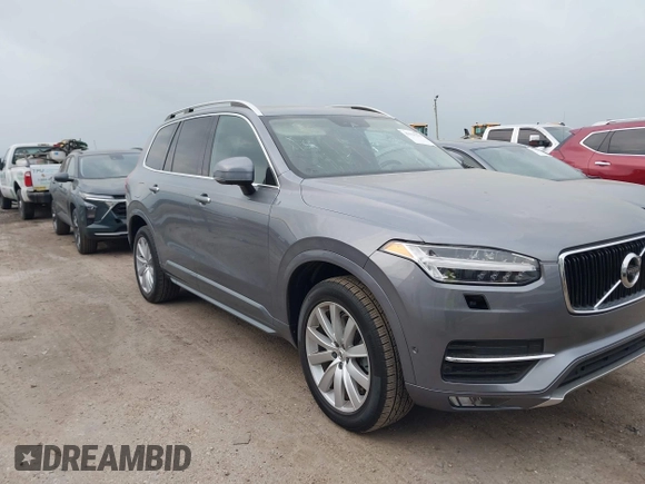 2016 Volvo XC90 T6 Momentum z VIN YV4A22PK5G1055854, wystawiony jako IAAI lot #41915279 z przebiegiem 88 237 mil mil oraz . Historia ofert i sprzedaży dostępna na DreamBid. Obrazek 1.