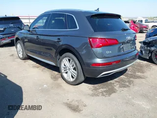 2018 Audi Q5 Premium Plus z VIN WA1BNAFY7J2149356, wystawiony jako IAAI lot #41851706 z przebiegiem 134 874 mil mil oraz . Historia ofert i sprzedaży dostępna na DreamBid. Obrazek 3.