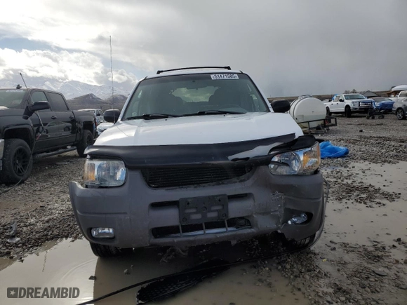 2002 Ford Escape Limited with VIN 1FMCU04152KA63778, listed as a Copart auction lot 51471585 with 103,803 mi miles and Salvage Title. Bid and sale history available at carsss.com. Image 5.