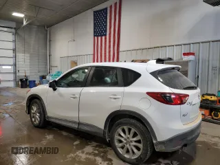 2013 Mazda CX-5 Grand Touring with VIN JM3KE4DE0D0105965, listed as a Copart auction lot 45732435 with 212,043 mi miles and Salvage Title. Bid and sale history available at carsss.com. Image 2.
