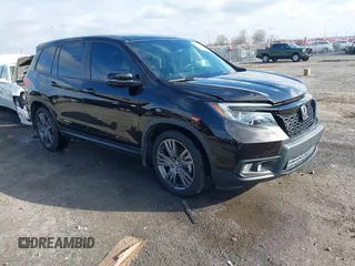 2021 Honda Passport EX-L with VIN 5FNYF7H56MB009450, listed as a IAAI auction lot 41474645 with 91,140 mi miles. Bid and sale history available at carsss.com. Image 1.