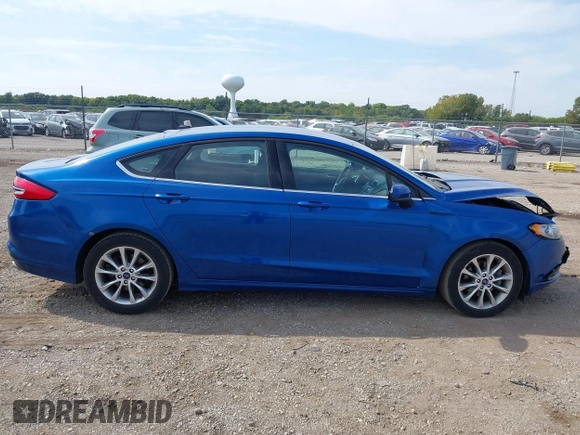 2017 Ford Fusion SE z VIN 3FA6P0H78HR195208, wystawiony jako IAAI lot #40384232 z przebiegiem 166 927 mil mil oraz . Historia ofert i sprzedaży dostępna na DreamBid. Obrazek 13.